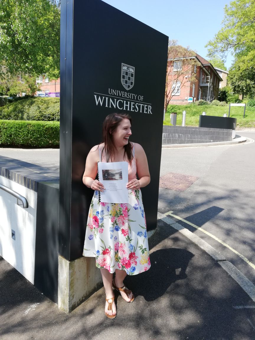 Laura with her dissertation