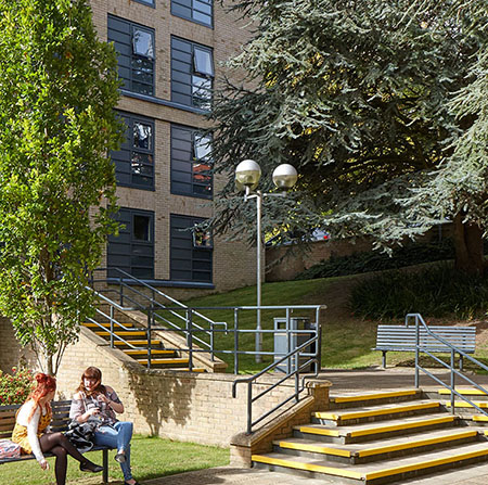 Students outside a block of flats