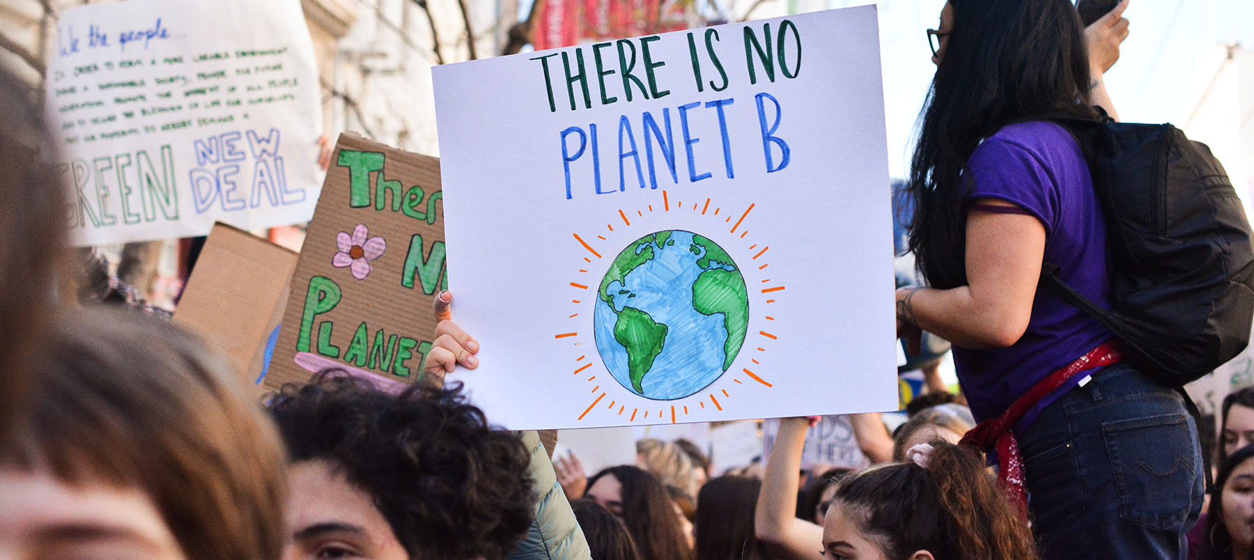 People holding signs in a protest