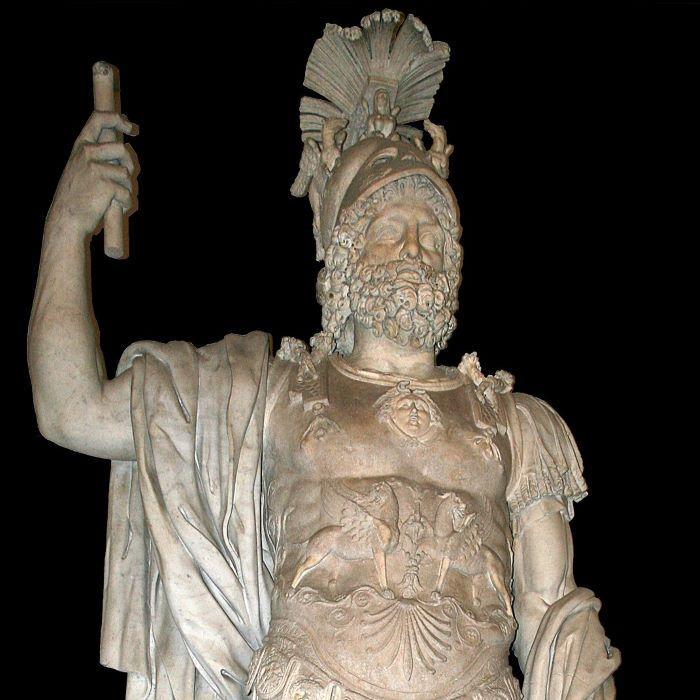 Roman statue of god Mars with helmet and sword