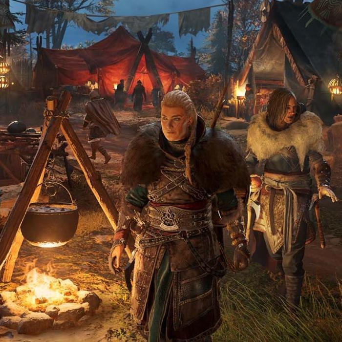 Still from video game showing Vikings round campfire