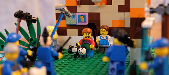 Lego figures with camera and microphone filming