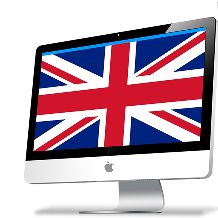 Two computers with union jack and EU flags as screen savers