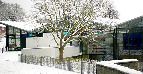 Exterior of campus building in the snow