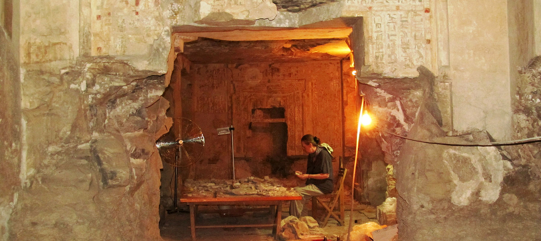 A lady doing research in ancient Egyptian building