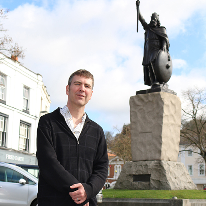 Ryan standing near King Alfred's statue in Winchester
