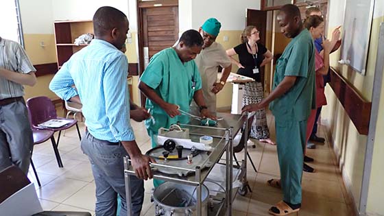 medics working in Tanzanian hospital room