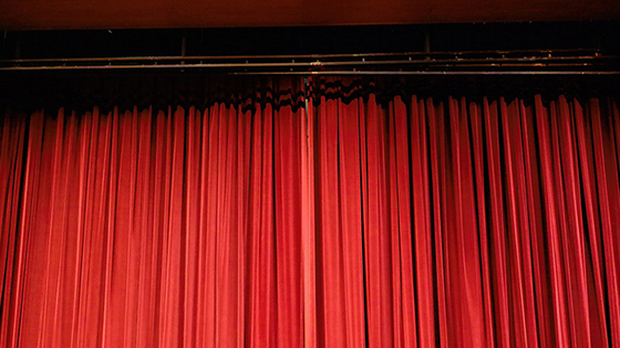 Closed red stage curtains