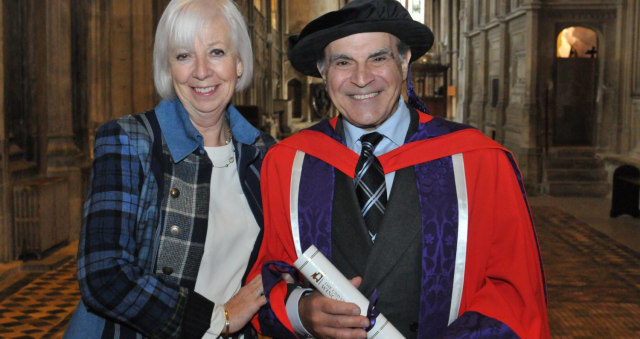 David Suchet smiles with wife after receiving honorary degree