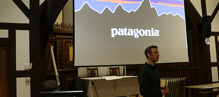 Man standing in front of presentation projection for Patagonia