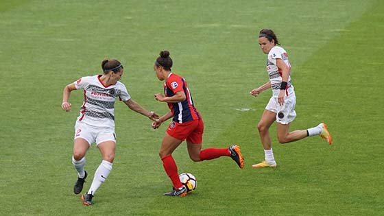 Professional female footballers playing