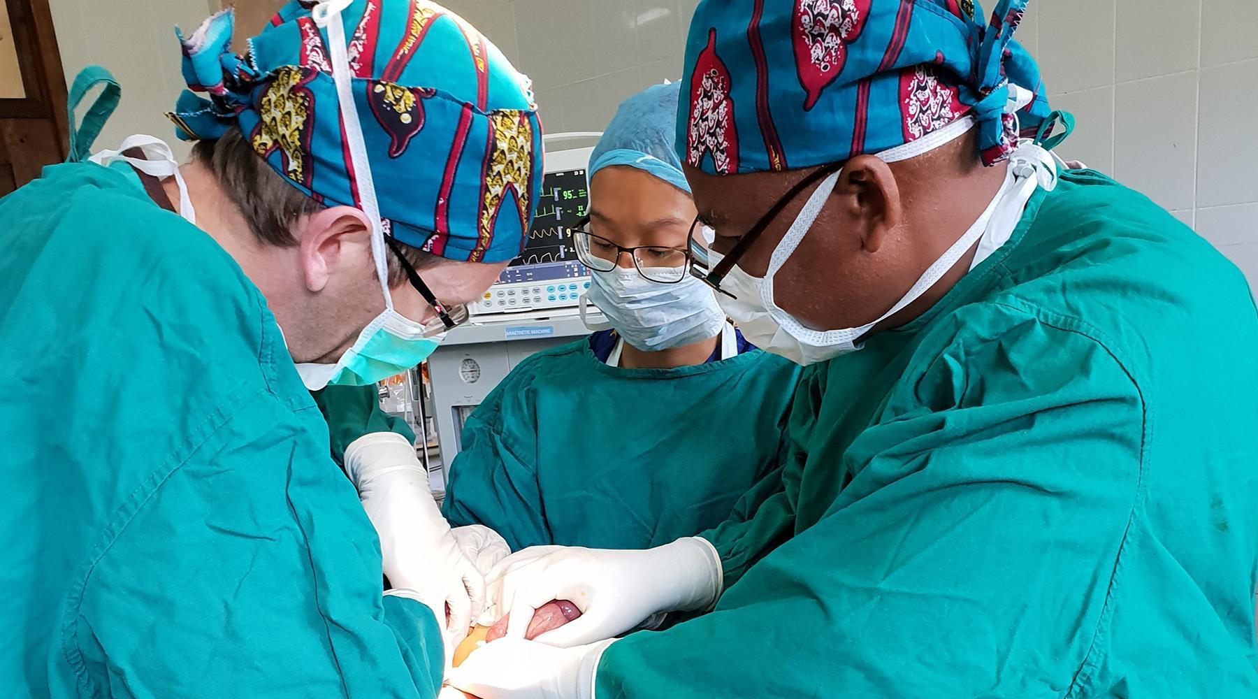 University of Winchester Global Health collaborations: surgeons carrying out a hernia operation