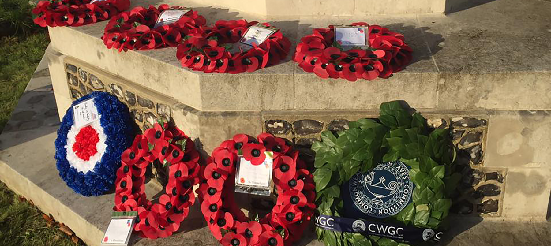 World War I commemoration at West Hill Cemetery, Winchester: wreaths laid at the cross of remembrance